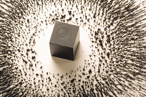 magnet and metal filings representing Kaaba by artist Ahmed Mater